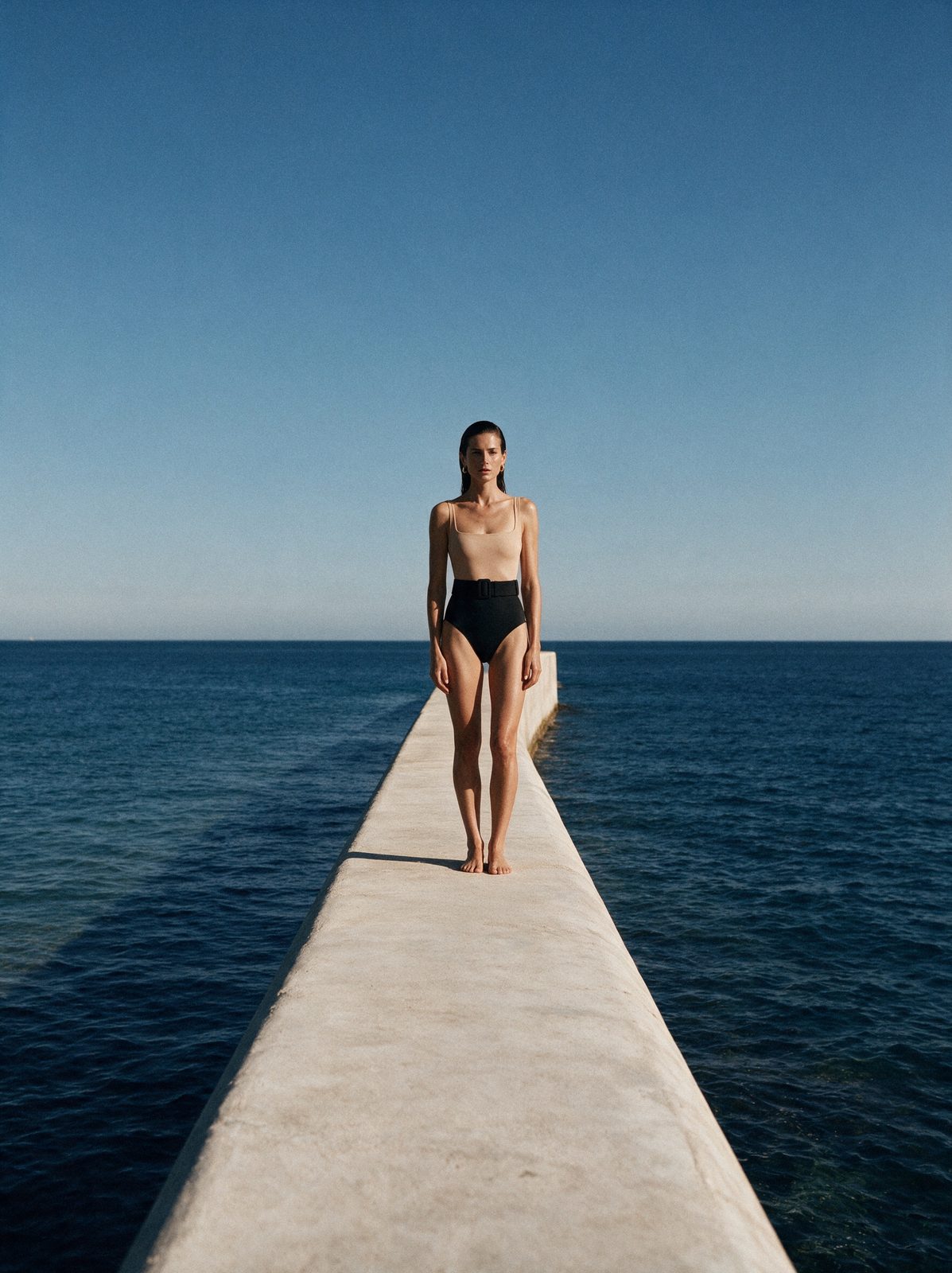 EVARAE Dune Noir, on the sea wall, made in the studio